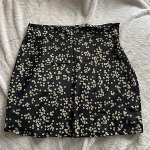 Black and daisy print skirt